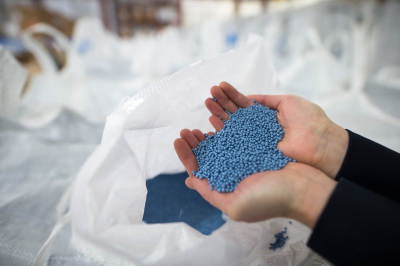Recycled plastic pellets used in the making of plastic bottles are displayed at a facility in Ontario, Canada.